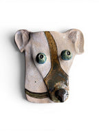 Detailed view of a handmade dog ceramic mask showing unique crackle texture and artisanal finish, size 24x22cm