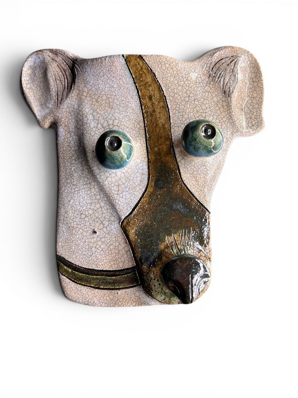 Artisan ceramic wall mask of a dog with Kannyu crackle glaze and green eyes, made from Belgian Sibelco stoneware