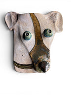 Artisan ceramic wall mask of a dog with Kannyu crackle glaze and green eyes, made from Belgian Sibelco stoneware
