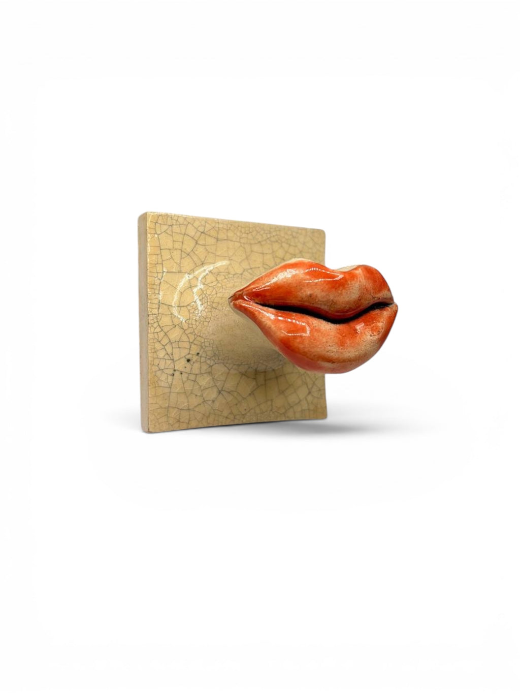 Artisan ceramic wall hook in the shape of lips with Kannyu crackle glaze background, handcrafted from Belgian Sibelco stoneware
