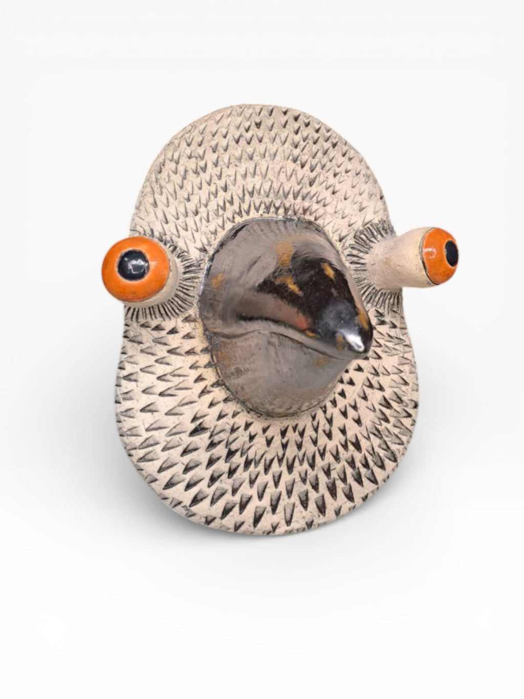 Artisan ceramic wall mask of a pigeon with detailed feather texture, made from Belgian Sibelco stoneware and German Terra Color glazes.