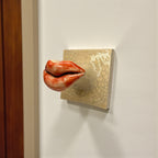 Detailed view of a unique ceramic lips hook for clothes showing textured artisanal finish and Kannyu technique, 10x10cm